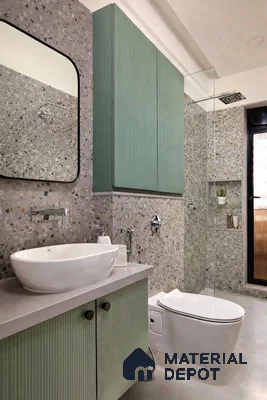 Modern bathroom with sage green fluted laminate vanity and terrazzo wall and floor tiles