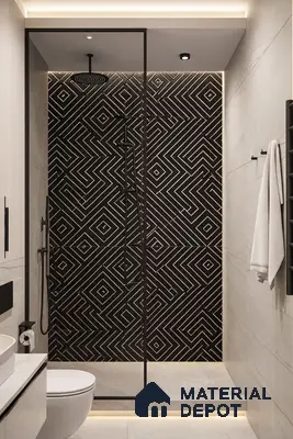 Modern bathroom with black geometric wall tiles and marble-look floor tiles