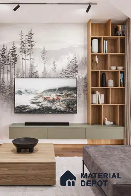 Scandinavian living room with forest mural wallpaper, oak wood shelving, and sage green floating TV unit