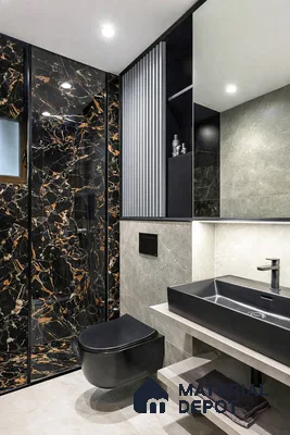 Modern bathroom with black marble wall tiles, grey stone wall tiles, and matte black sanitaryware