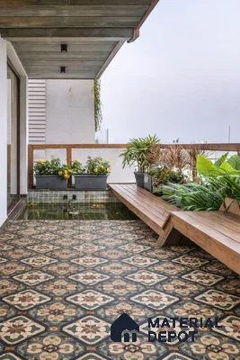 Eclectic balcony with patterned moroccan floor tiles and wooden bench seating