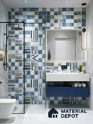 Modern bathroom with blue geometric patterned wall tiles and white marble look floor tiles in 3 BHK apartment Tetra Grand Green Aspire Jakkur Bengaluru