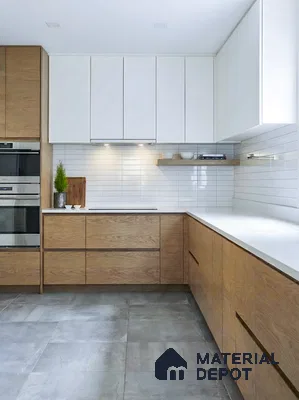 Scandinavian kitchen with white quartz countertop, oak wood laminate cabinets, and white subway backsplash tiles in 4 BHK apartment Total Environment Learning To Fly 7th Phase JP Nagar Bengaluru