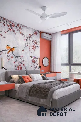Modern bedroom with chinoiserie floral wallpaper, grey upholstered bed, and terracotta accent walls