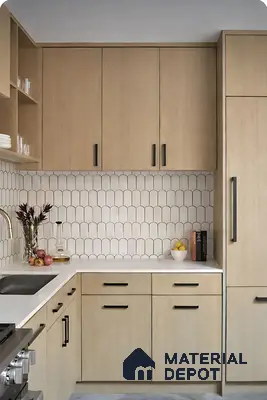 Scandinavian kitchen with light oak wood laminate cabinets and white scallop backsplash tile
