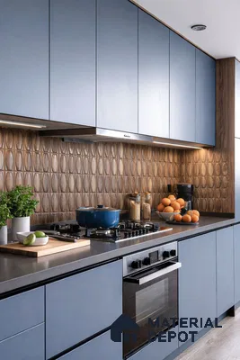 Modern kitchen with matte blue laminate cabinets and brown geometric backsplash tile