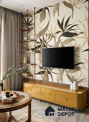 Modern living room with tropical patterned wallpaper, mustard yellow high gloss TV unit, and wooden shelving of 3 BHK apartment in Vaishnavi Gardenia Choodasandra Bengaluru