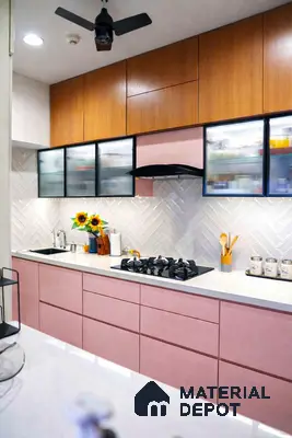 Modern kitchen with pastel pink laminate, wood grain laminate, and white herringbone subway tile backsplash