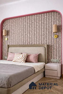 Modern bedroom with terrazzo fluted accent wall, blush pink upholstery, and herringbone wooden flooring