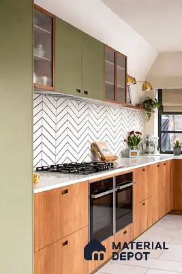 Modern dual tone kitchen with olive green laminate, natural wood laminate, and white chevron backsplash tile