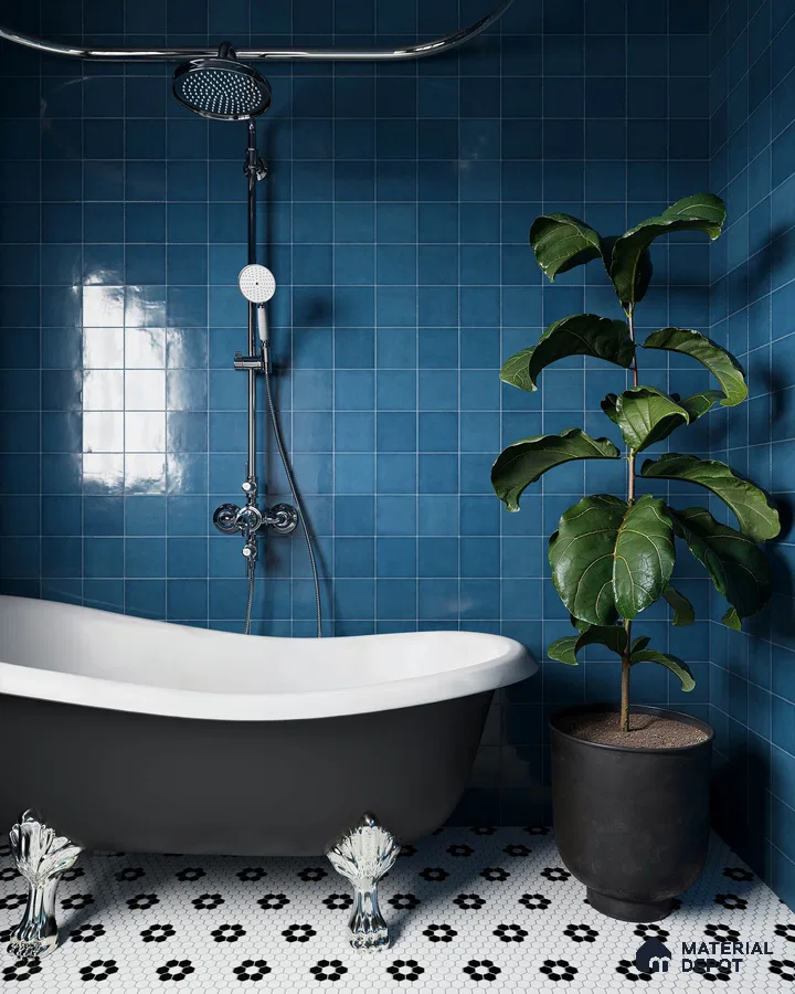 Bold Blue Tiled Bathroom with Black and White Patterned Floor and Freestanding Tub | Material Depot