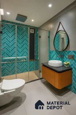 Bold Teal-Themed Bathroom with Full-Height Herringbone Tiles, Frameless Glass Shower, Floating Wooden Vanity & Modern Fixtures in Prestige Kensington Gardens Jalahalli | Material Depot