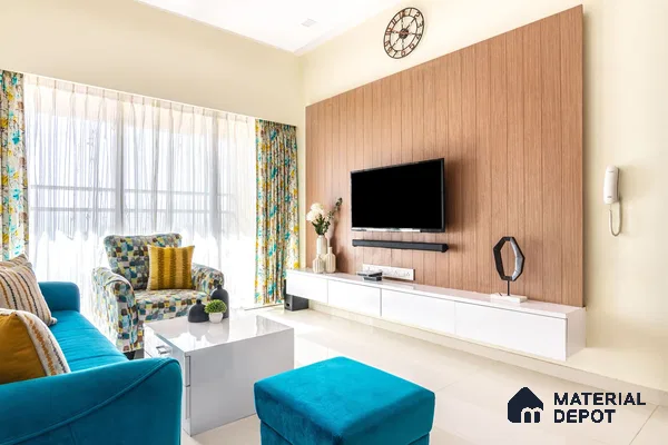 Stylish blue and wood living room in a Mumbai 2 BHK flat.
