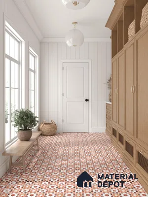 Entry way with patterned floor tile and beige laminate