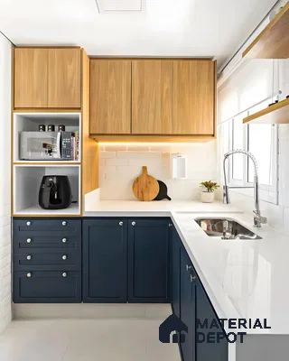 Compact kitchen with sleek navy lower cabinets, white quartz countertop, and warm wood accents. | Material Depot
