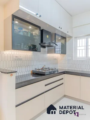 Compact L-Shaped Kitchen With Glossy Laminate Finish And Scallop Tile Backsplash | Material Depot