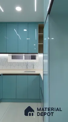 Compact U-Shaped Modular Kitchen With Glossy Blue Cabinets And Geometric Backsplash | Material Depot