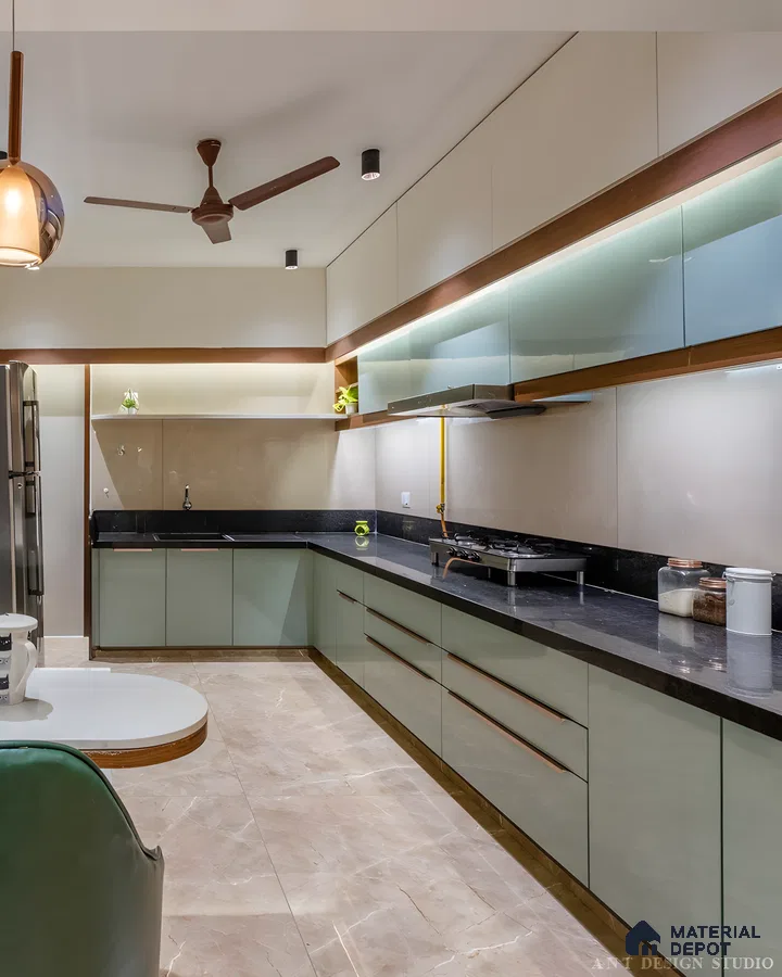 Contemporary Indian Kitchen With Frosted Glass Cabinets And Black Granite Countertops | Material Depot