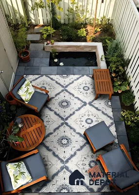 Cozy Patio with Outdoor Rug and Water Feature | Material Depot