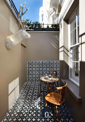 Cozy Patio with Patterned Tiles and Vintage Decor | Material Depot