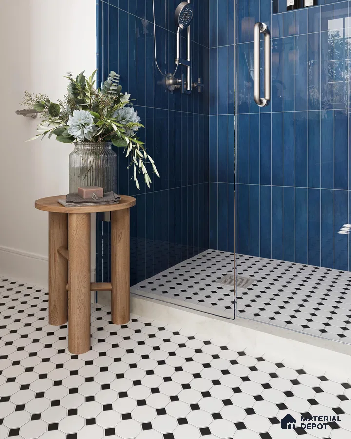 Dramatic Blue Tiled Shower with Black and White Patterned Floor and Modern Fixtures | Material Depot
