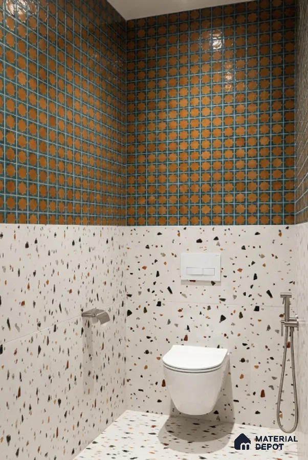 Eclectic bathroom with orange geometric wall tiles and terrazzo wall and floor tiles