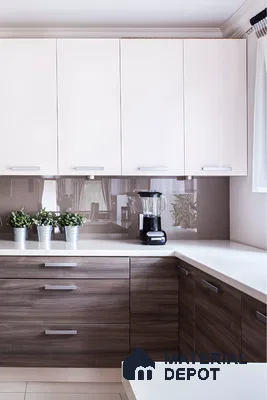 Elegant Kitchen With Stainless Steel Accents And Under-Cabinet Lighting | Material Depot
