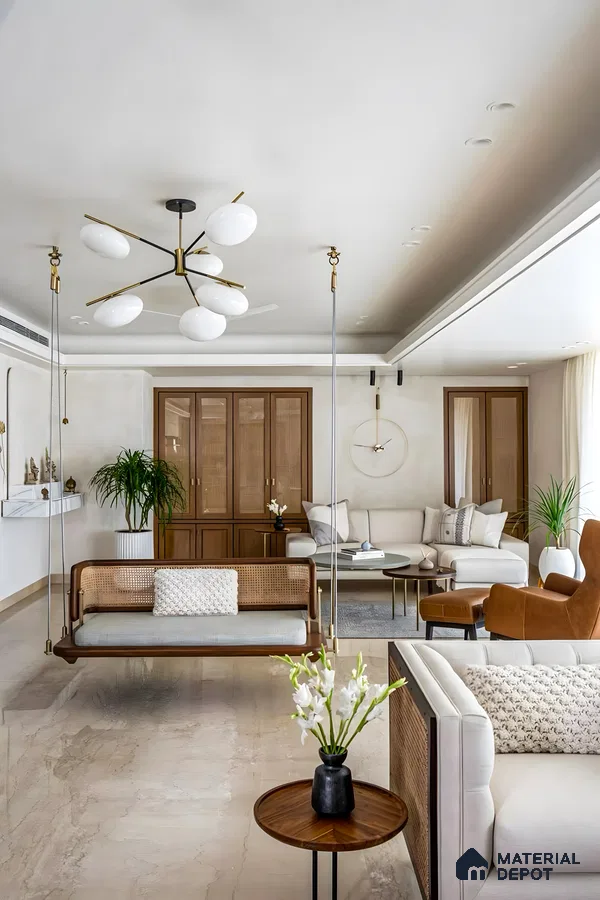 Elegant Living Room with Golden Accents and Natural Lighting | Material Depot