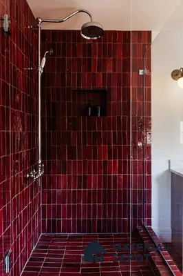 Elegant Shower with Burgundy Subway Tiles and Modern Fixtures | Material Depot
