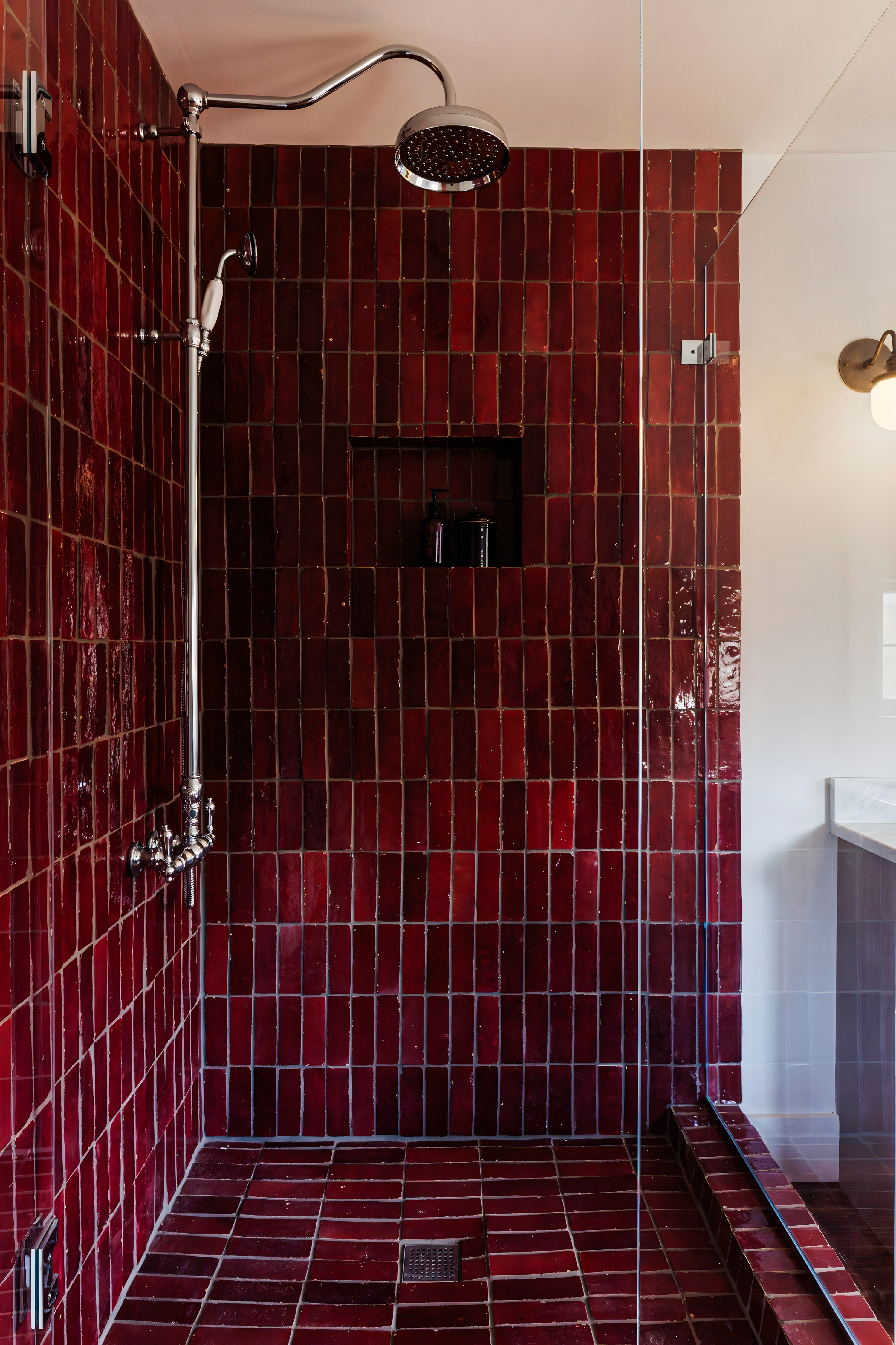Elegant Shower with Burgundy Subway Tiles and Modern Fixtures | Material Depot