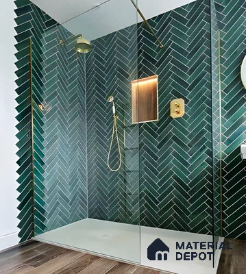 Elegant Shower with Teal Herringbone Tiles and Gold Fixtures | Material Depot