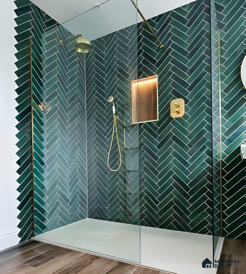 Elegant Shower with Teal Herringbone Tiles and Gold Fixtures | Material Depot