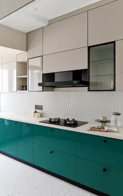 Modern kitchen with contemporary finishes, sleek surfaces, and cutting-edge appliances.