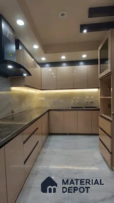 Glossy Brown And Black Modular Kitchen With Marble Backsplash And Sleek Ceiling Lighting | Material Depot