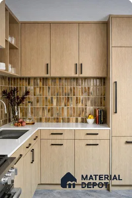 Scandinavian kitchen with light oak laminate cabinets and vertical brown kitkat backsplash tiles