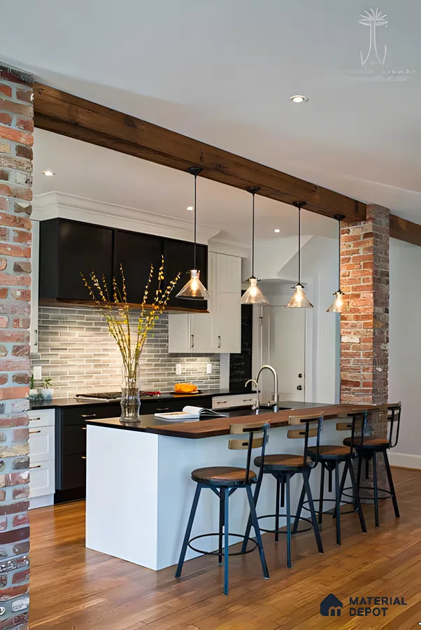 Industrial-style kitchen with exposed brick walls, sleek pendant lights, and a minimalist island. | Material Depot
