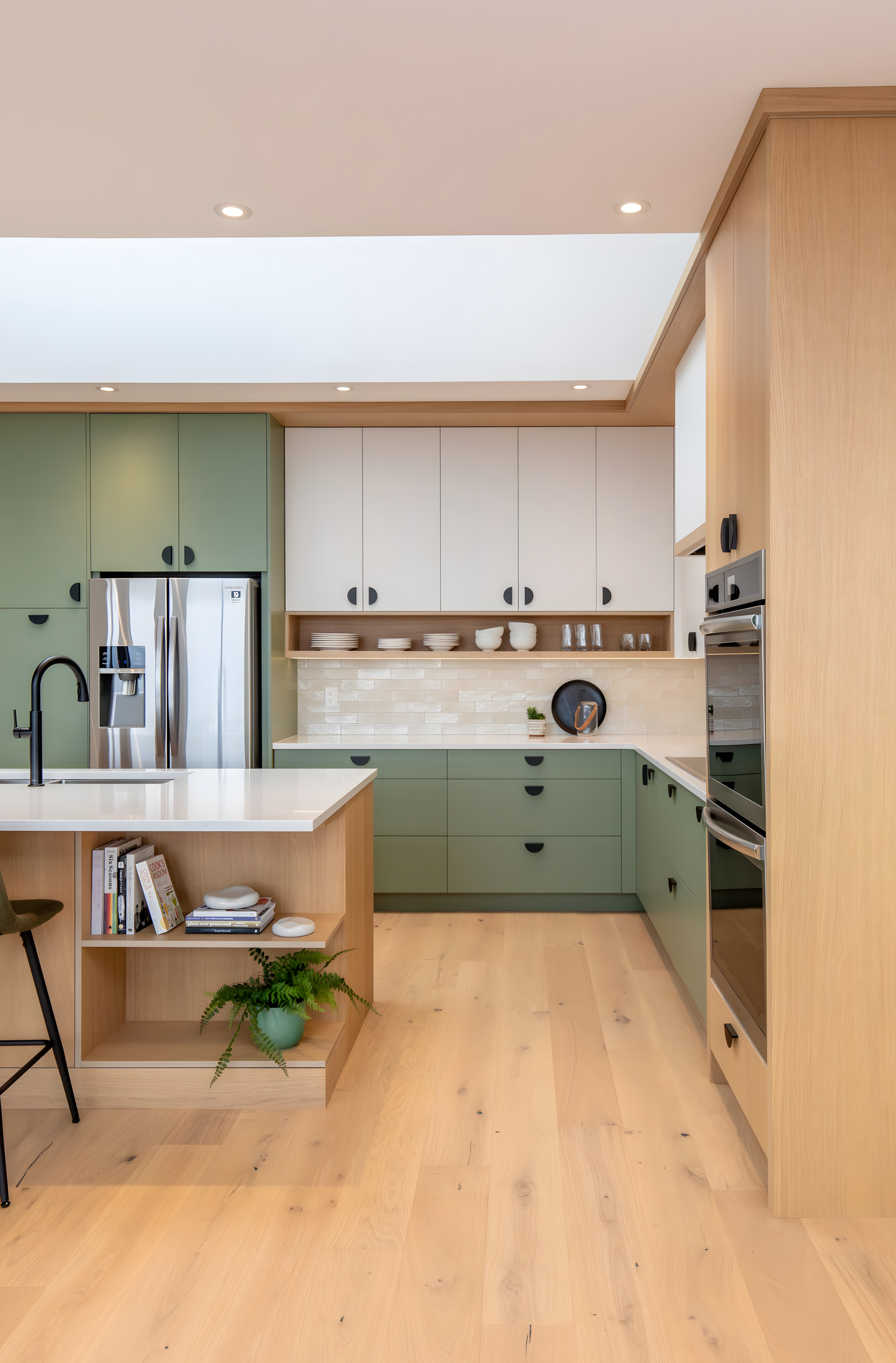 Kitchen With Green Plywood Cabinets And Light Wood Accents | Material Depot