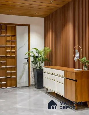 Modern foyer with walnut wood fluted wall panels, white and walnut console, and marble look floor tile of 3 BHK apartment in Kumar Princetown Jalahalli Bengaluru