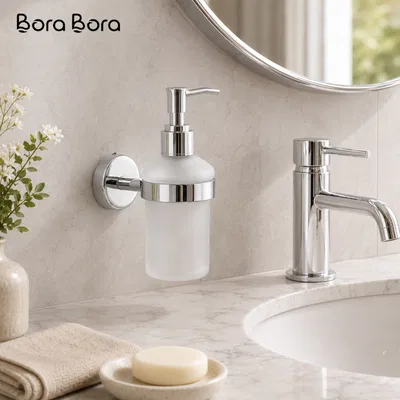 Liquid Soap Dispensers - frosted glass soap dispenser in a chrome wall holder beside a basin tap