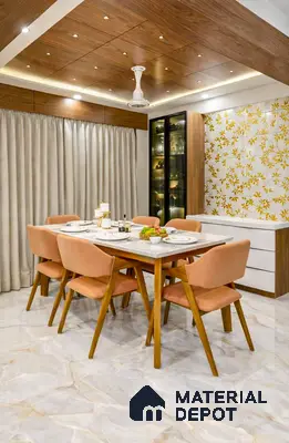 Modern dining room with marble-look floor tiles, wood ceiling panels, and gold floral accent wall tiles in 3 BHK apartment Mahaveer Cedar Chikkasandra Bengaluru