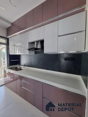 Mauve & Gloss: A Sleek Parallel Kitchen With Modern Elegance | Material Depot