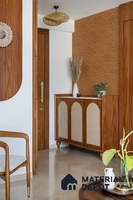 Mid-century modern foyer with walnut wood laminate, cane cabinet, and terracotta geometric wallpaper in Sattva Anugraha Vijayanagar 3 BHK Bengaluru Apartment