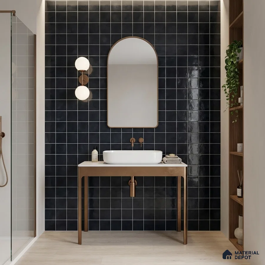 Minimalist bathroom with glossy black square wall tiles and light wood flooring
