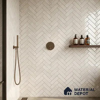 Minimalist bathroom with off-white herringbone subway wall tiles and matte beige floor tiles