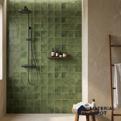 Minimalist bathroom with olive green square wall tiles and beige stone-look floor tiles