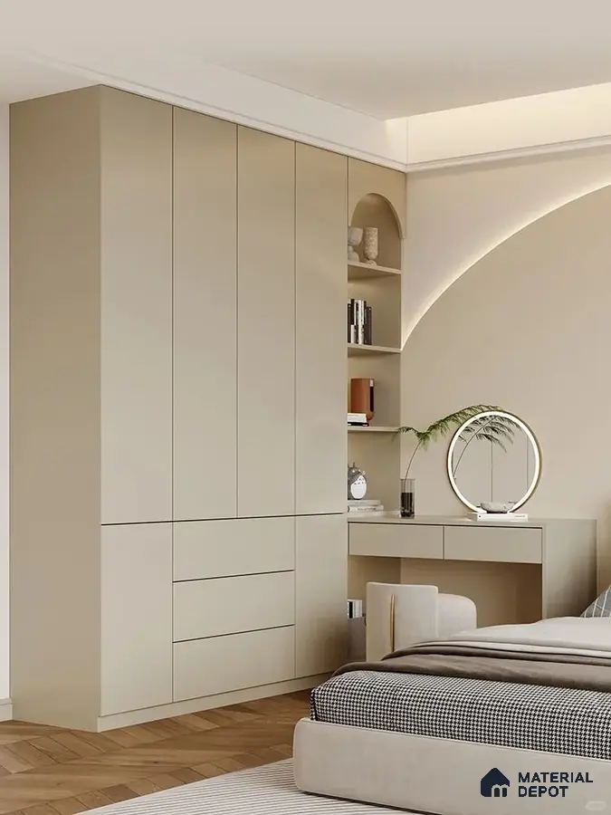 Minimalist bedroom with beige matte laminate wardrobe, built-in study, and herringbone wooden flooring | Material Depot