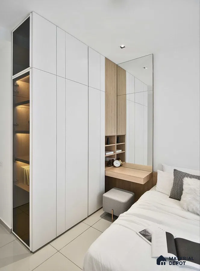 Minimalist bedroom with frosty white laminate wardrobe, light oak laminate study desk, and large wall mirror | Material Depot