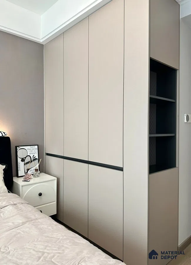 Minimalist bedroom with matte beige laminate wardrobe and open shelving | Material Depot