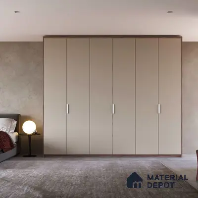 Minimalist bedroom with matte beige laminate wardrobe and textured wall finish | Material Depot