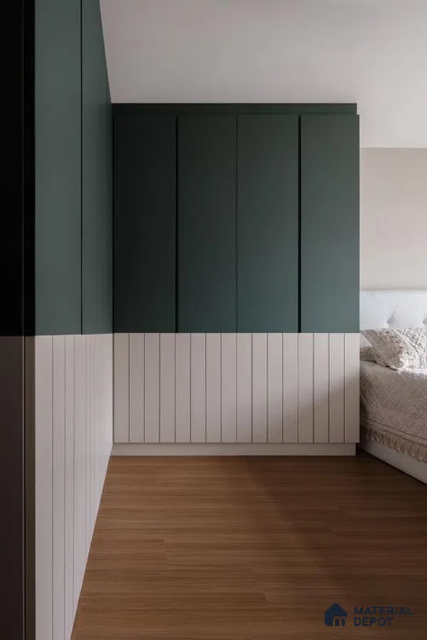 Minimalist bedroom with sage green and white laminate wardrobe and light oak wooden flooring | Material Depot